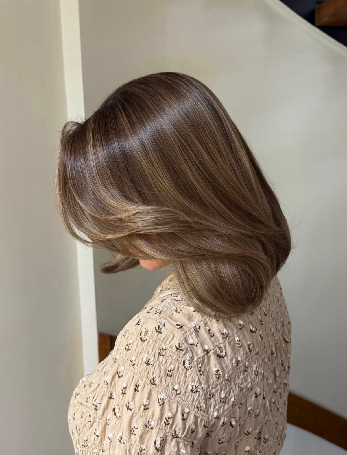 Brunette hair with softly blended cappuccino tones and subtle highlights